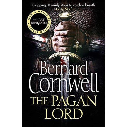 Six paperback books from the Saxon Tales collection by Bernard Cornwell, featuring historical fiction with medieval themes.