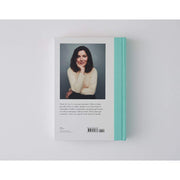 Hardcover cookbook "Cook, Eat, Repeat" by Nigella Lawson featuring ingredients, recipes, and stories on the cover.