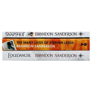 Set of three Brandon Sanderson books including Snapshot, Legion, and Edgedancer by Gollanc in hardcover with colorful covers.