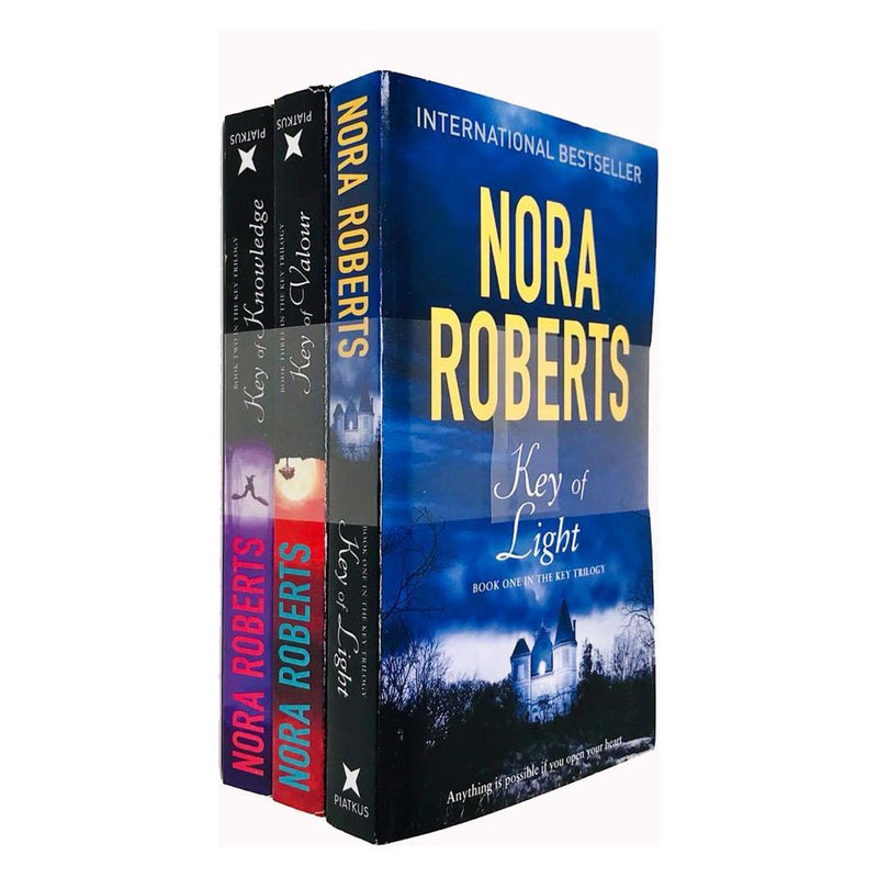 Three paperback fiction books from the Key Trilogy collection by Nora Roberts, featuring colorful cover art.