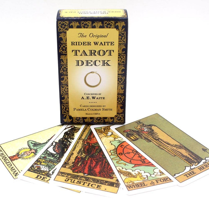 The Rider Waite Tarot Deck by A.E. Waite and Pamela Colman Smith, showing colorful tarot cards laid out on a surface.