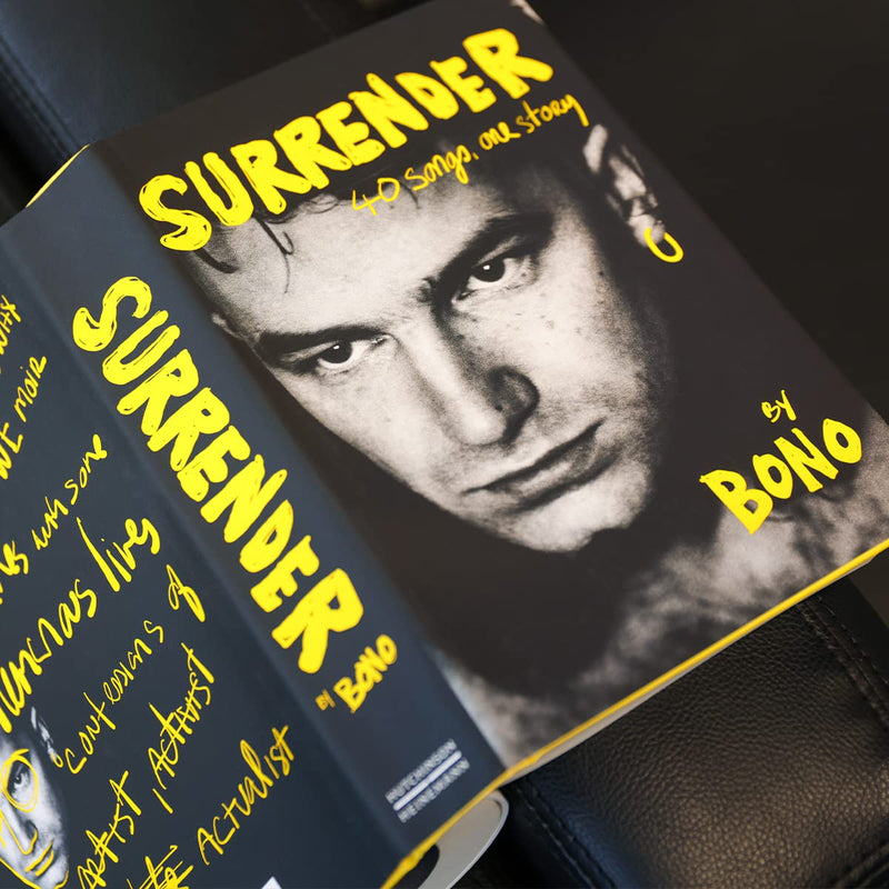 Hardcover copy of Bono's autobiography "Surrender: Bono Autobiography" with 40 songs and personal story, published by Hutchinson Heinemann.