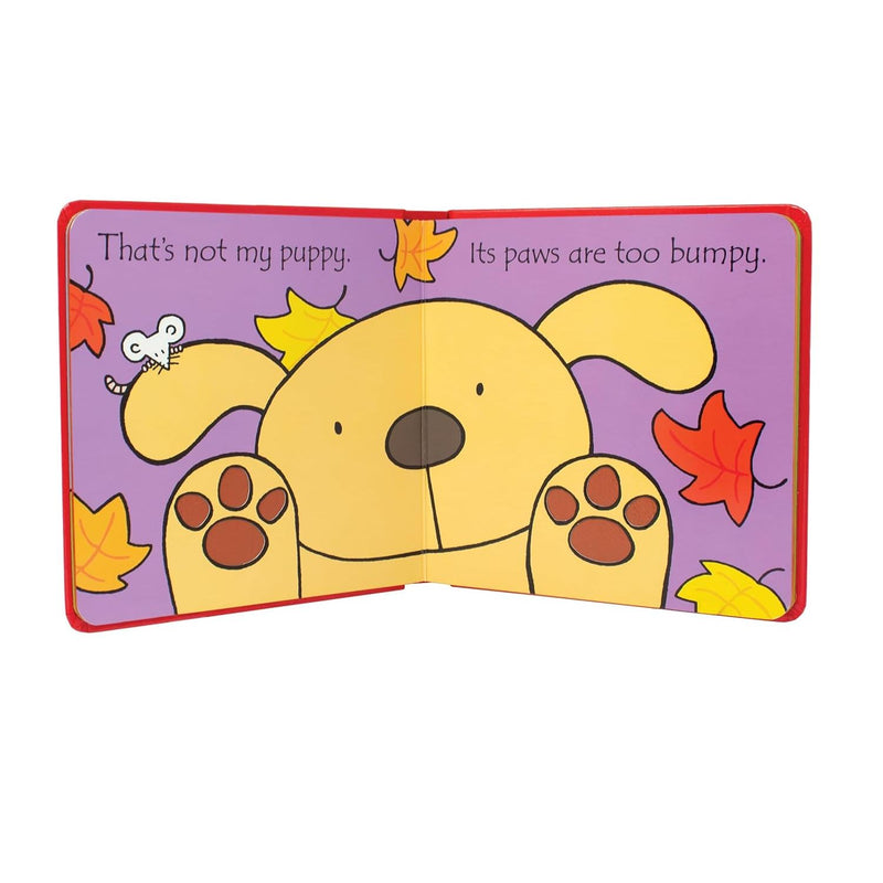 Children's book cover titled "That's not my puppy...: its coat is too hairy" by Fiona Watt, featuring a cute puppy illustration.