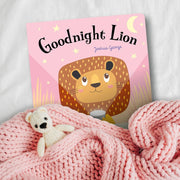 Hardcover of Goodnight Lion magic torch book by Joshua George, featuring colorful illustrations and a lion character.