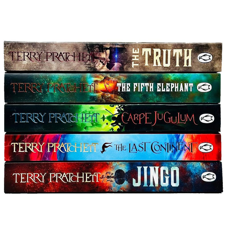Set of five Discworld novels by Terry Pratchett in paperback, part of the Penguin series, featuring colorful cover art.