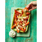 Cover of The Ultimate Air Fryer Cookbook by Clare Andrews, featuring vibrant food images and the book title.
