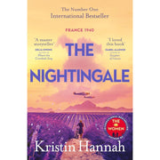 Set of 12 paperback Kristin Hannah fiction books in a collection, showcasing colorful covers and spines in a pan view.