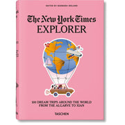 Hardcover book titled "The New York Times Explorer" by Barbara Ireland, showcasing 100 dream trips around the world.