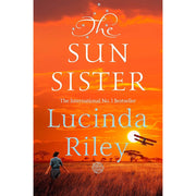 Set of three Lucinda Riley The Seven Sisters series books: The Pearl Sister, The Moon Sister, and The Sun Sister arranged on a pan.