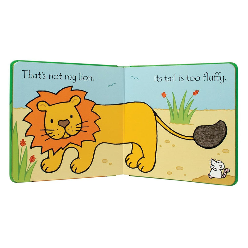 Close-up of the board book "That's Not My Lion" by Fiona Watt, showing colorful illustrated lion with fuzzy nose for infants ages 0-2.