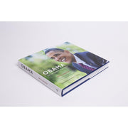 Cover of "Obama: An Intimate Portrait" photography book by Pete Souza featuring Barack Obama during his presidency.