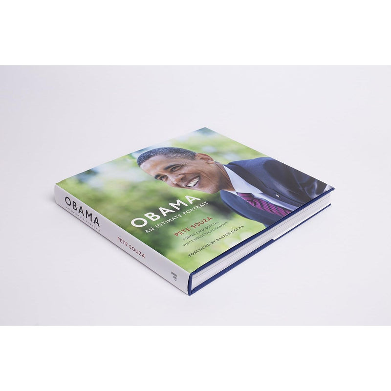 Cover of "Obama: An Intimate Portrait" photography book by Pete Souza featuring Barack Obama during his presidency.