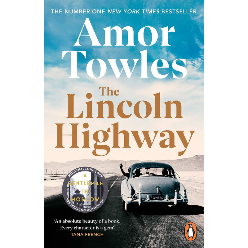Paperback of "The Lincoln Highway" by Amor Towles, a Penguin book, featuring the cover with the title and author's name.
