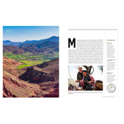Hardcover of Gordon Ramsay's Uncharted cookbook with 60 global recipes, featuring National Geographic branding and vibrant cover art.