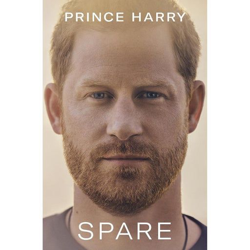 Hardcover copy of "Spare" by Prince Harry, a nonfiction book published by Bantam, featuring a black and white cover design.