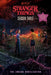 Cover image of Stranger Things Season Three Junior Novelization by Matthew J. Gilbert, featuring characters from the popular Netflix series.