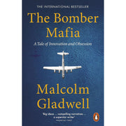 Paperback of The Bomber Mafia book by Malcolm Gladwell, published by Penguin, featuring a cover with military aircraft illustration.