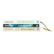 Donna Hay collection of three cookbooks including One Pan Perfect, Basics to Brilliance, and Everyday Fresh, displayed together.