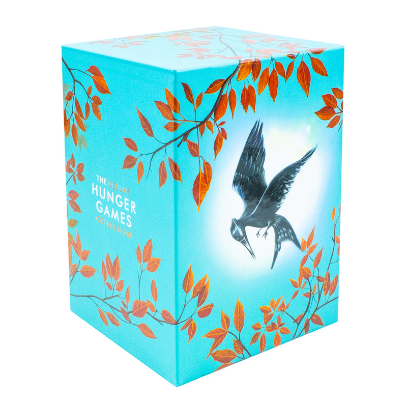 Deluxe Hunger Games box set by Suzanne Collins includes four Scholastic books: Catching Fire and Mockingjay visible in the image.