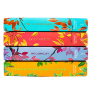 Deluxe Hunger Games box set by Suzanne Collins including Catching Fire and Mockingjay books in a collectible Scholastic edition.