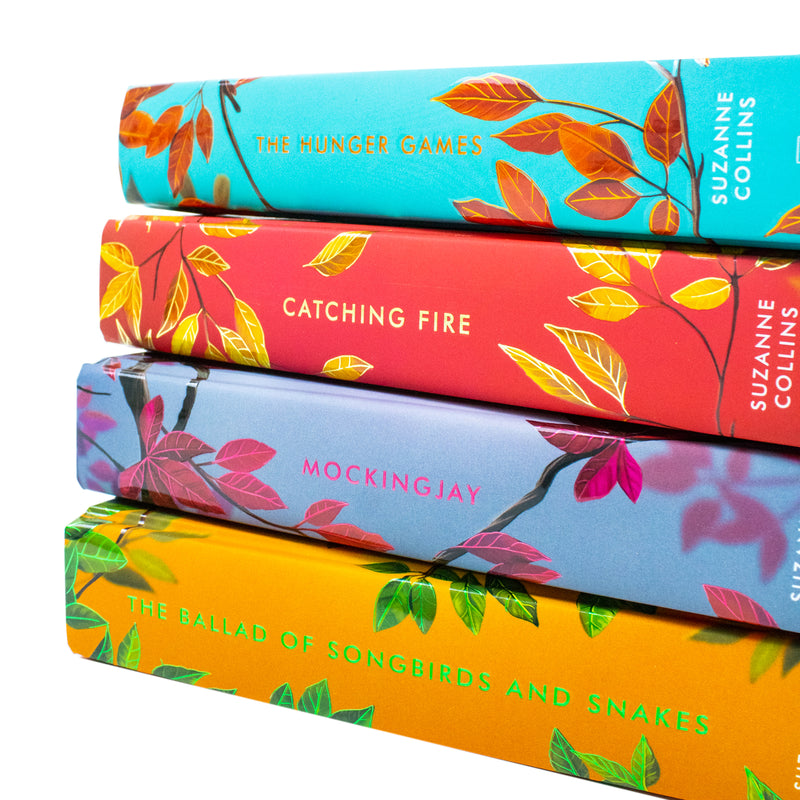 Deluxe Hunger Games box set by Suzanne Collins including Catching Fire and Mockingjay books, Scholastic edition, with colorful covers.