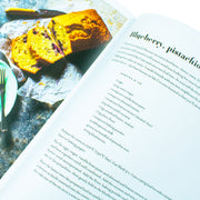 Hardcover of "Simply: Easy Everyday Dishes" by Sabrina Ghayour, fifth book in her Persiana Sirocco Feasts Bazaar series with colorful cover.