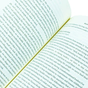 Paperback of Dare to Lead by Brene Brown, featuring bold lettering on the cover with the title and author's name visible.