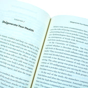 Paperback book titled "Eat to Beat Disease" by Dr. William Li, showing cover with title and author's name.
