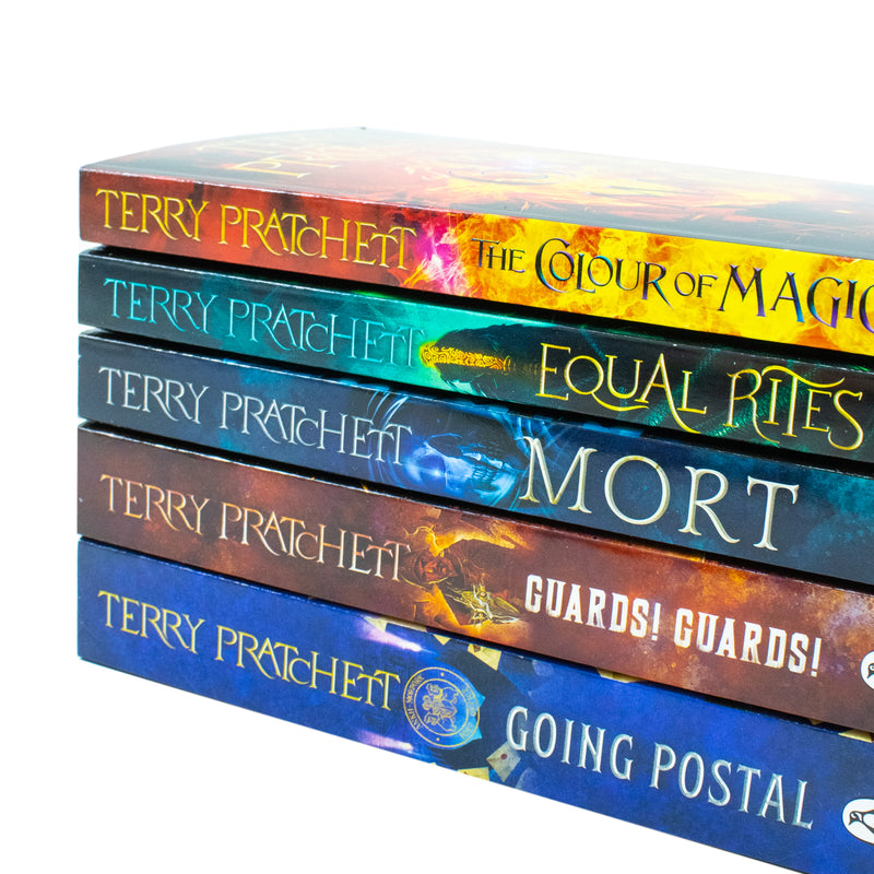 Set of five Terry Pratchett Discworld novels in hardcover, including The Colour of Magic, Equal Rites, Mort, Guards! Guards!, and Going Postal.
