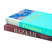 Hardcover collection of two Sabrina Ghayour books, Bazaar & Persiana, by Mitchell Beazley, featuring vibrant covers and culinary themes.
