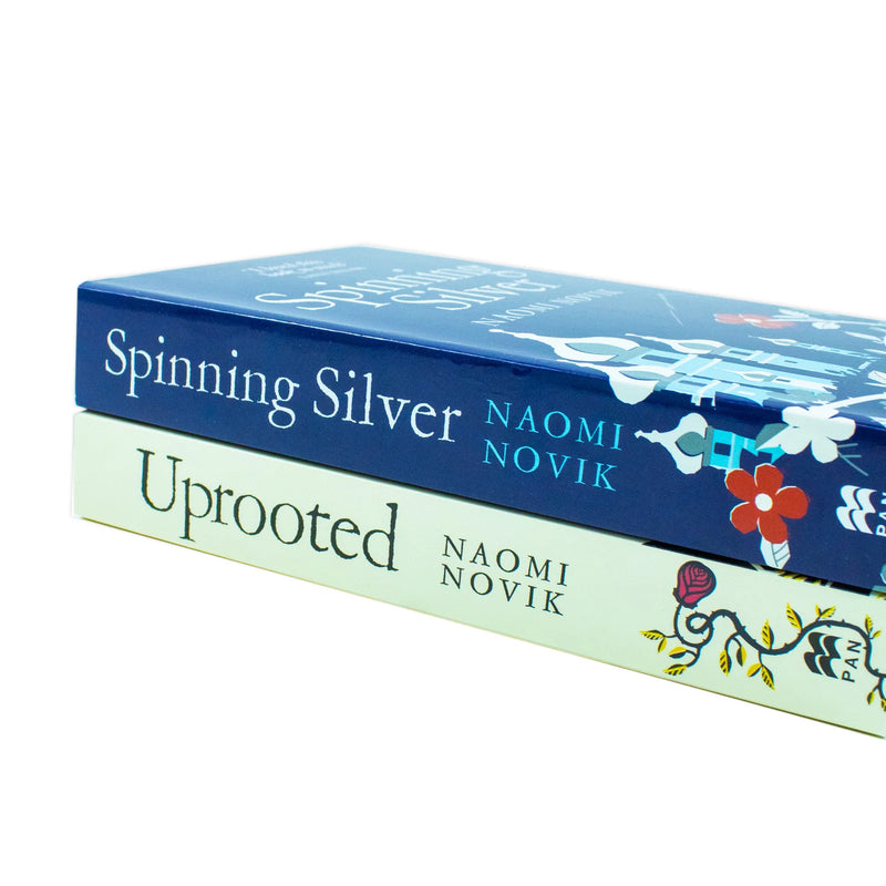 Uprooted and Spinning Silver 2-book paperback collection by Naomi Novik beside a decorative pan-shaped prop