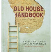 Old House Handbook by Roger Hunt, practical guide to care and repair of historic homes, showcasing a classic house exterior.