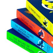 Set of four paperback books from Suzanne Collins' The Hunger Games series by Scholastic, featuring the iconic book covers.