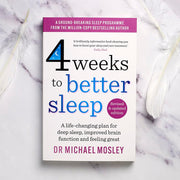 Paperback book titled "4 Weeks to Better Sleep" by Dr. Michael Mosley, showing the cover with sleep-themed design.