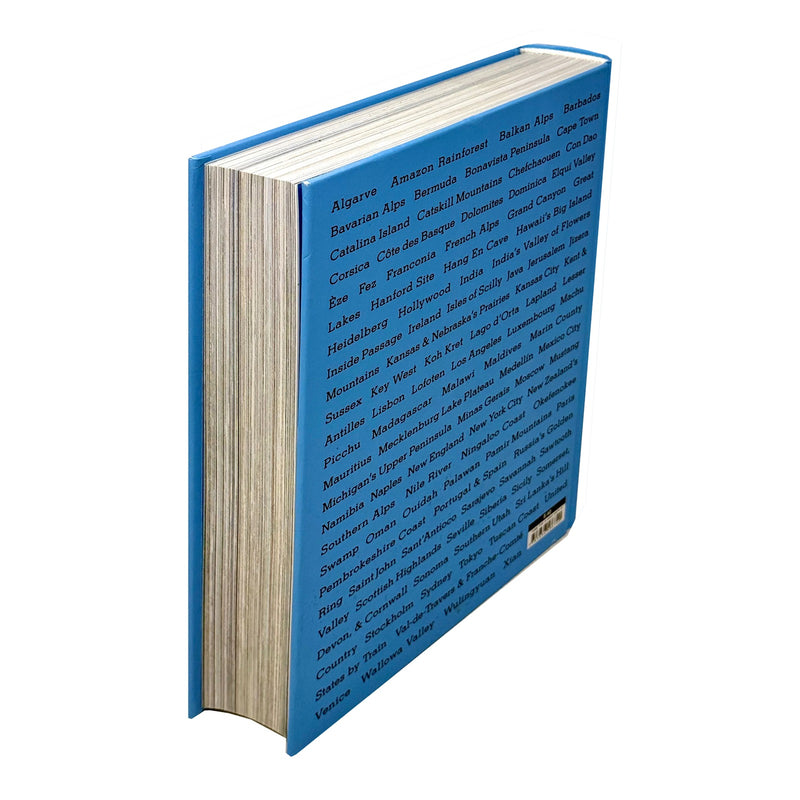Hardcover of The New York Times Explorer 100 Trips Around The World book by Taschen, featuring a colorful world map on the cover.