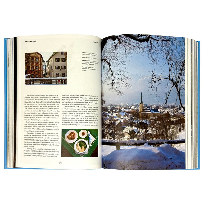 Hardcover book "The New York Times Explorer: 100 Trips Around the World" by Taschen, featuring colorful travel images on the cover.