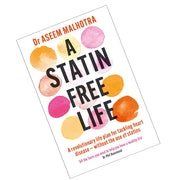 Paperback book titled "A Statin-Free Life" by Dr. Aseem Malhotra, focusing on heart disease prevention, with a yellow cover.