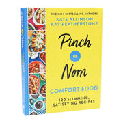 Book cover of "Pinch of Nom Comfort Food" by Kay and Kate Allinson featuring a cozy meal setting and colorful dish images.