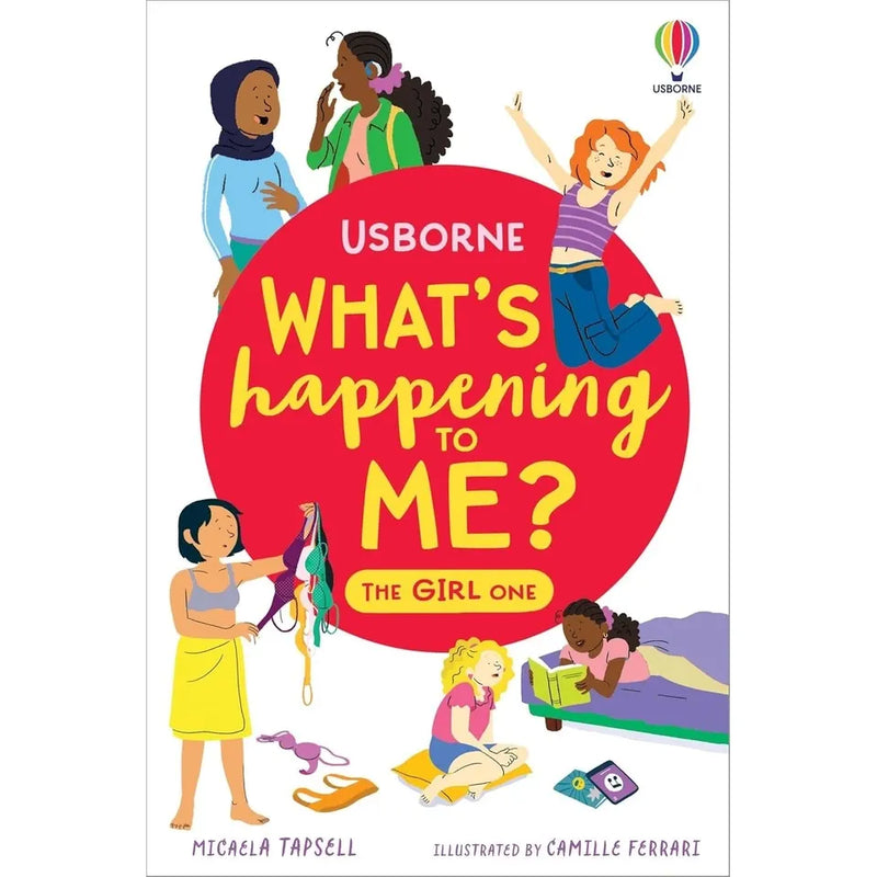 Set of two Usborne Publishing non-fiction paperback books, "What's Happening to Me" for girls and boys, showing colorful cover art.