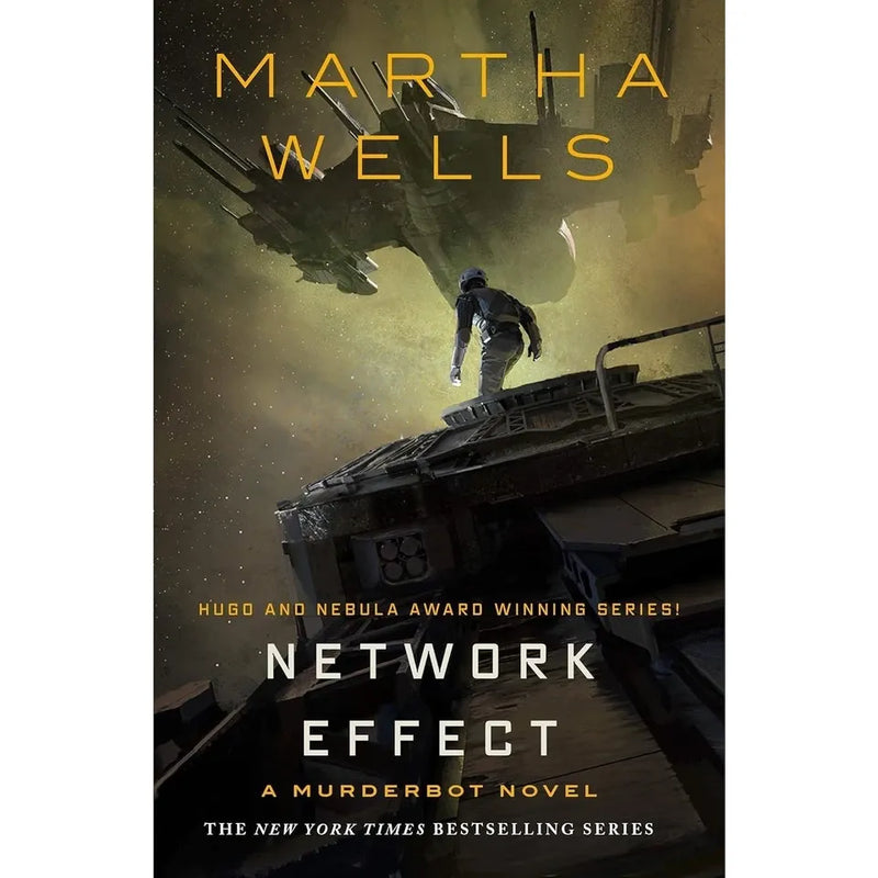 Seven paperback books from Martha Wells' The Murderbot Diaries collection, featuring sci-fi fiction by Tor Books.