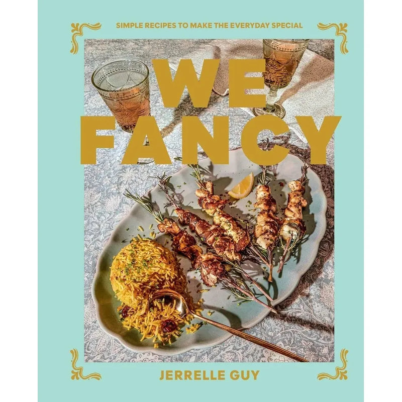 Two hardcover cookbooks from the We Fancy and Nom Nom Chinese Takeaway series by Jerrelle Guy and Iota, featuring simple recipes.