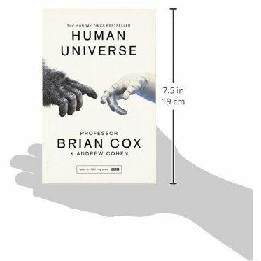 Paperback copy of Human Universe nonfiction book by William Collins, featuring Cox brand on the cover.