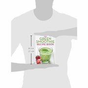 Open green smoothie recipe book by Mendocino Press featuring vibrant images of healthy smoothies on pages.
