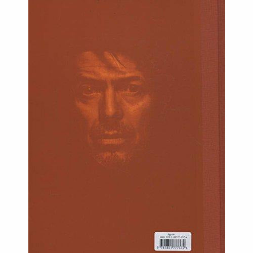 Hardcover David Bowie Is exhibition catalogue by V & A Publications featuring art and music of David Bowie.