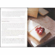 Hardcover copy of The River Cottage Year by Hugh Fearnley-Whittingstall, non-fiction book about seasonal cooking and rural life.