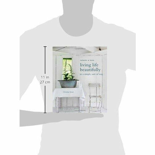 Hardcover book "Living Life Beautifully" by Christina Strutt with Nancy Alsop, featuring inspiring lifestyle and design ideas.