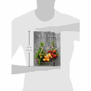 Cover of "Wild Food: A Complete Guide for Foragers" hardcover book by Roger Phillips, featuring nature-inspired illustrations.