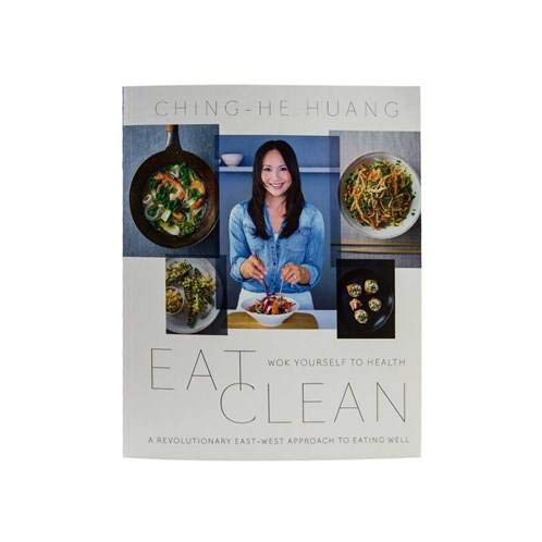 Paperback book titled "Eat Clean: Wok Yourself to Health" by Ching-He Huang, featuring a cover with Asian-inspired design elements.