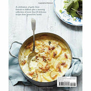 Hardcover book titled "Garlic: More Than 65 Deliciously Different Ways to Enjoy Cooking With Garlic" by Jenny Linford, featuring garlic dishes.