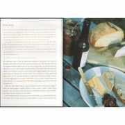Hardcover copy of The River Cottage Year by Hugh Fearnley-Whittingstall, non-fiction book about seasonal cooking and rural life.